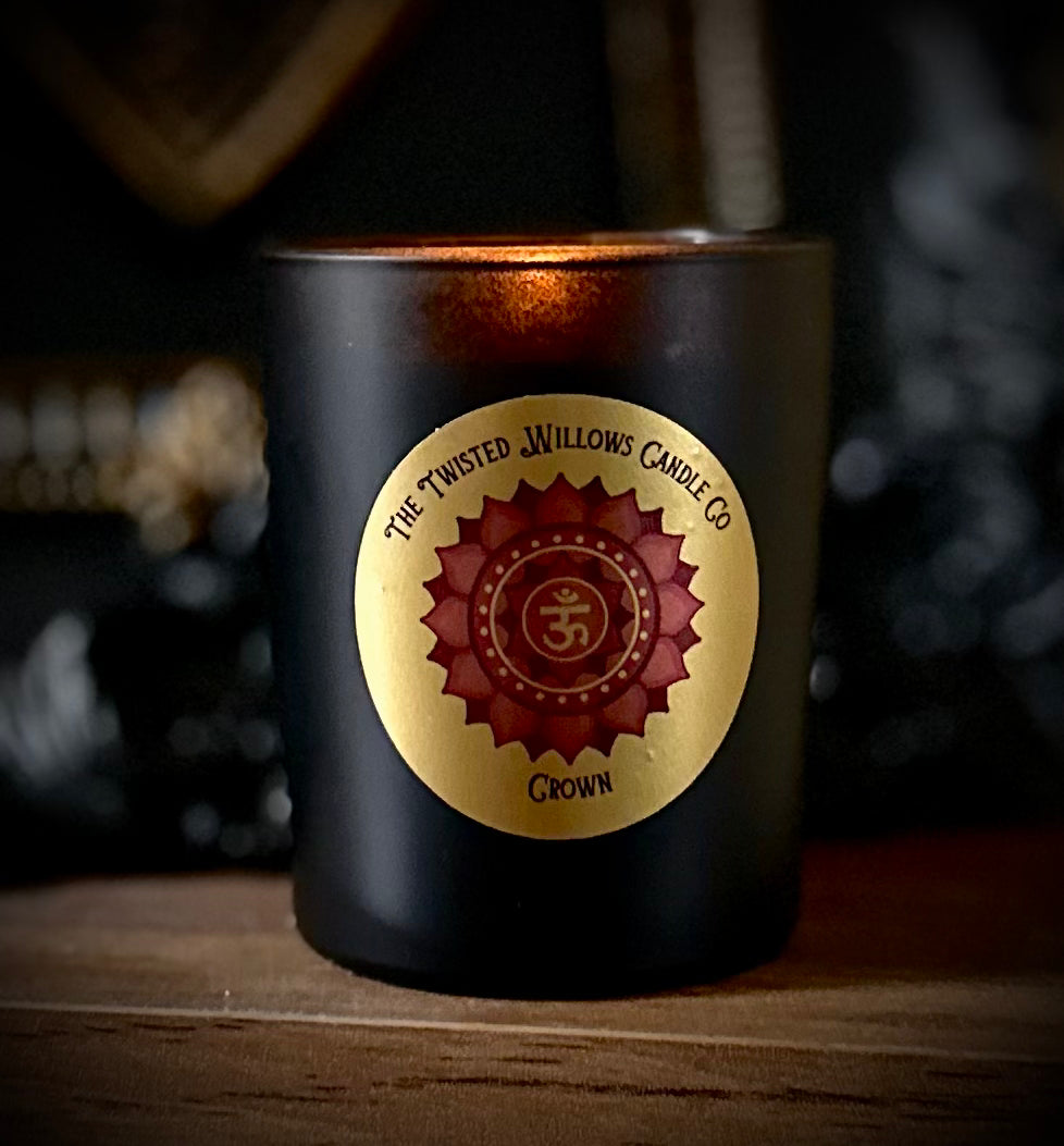 Meditative Crown Chakra Candle lit during spiritual practice with frankincense for clarity and lavender for calm.