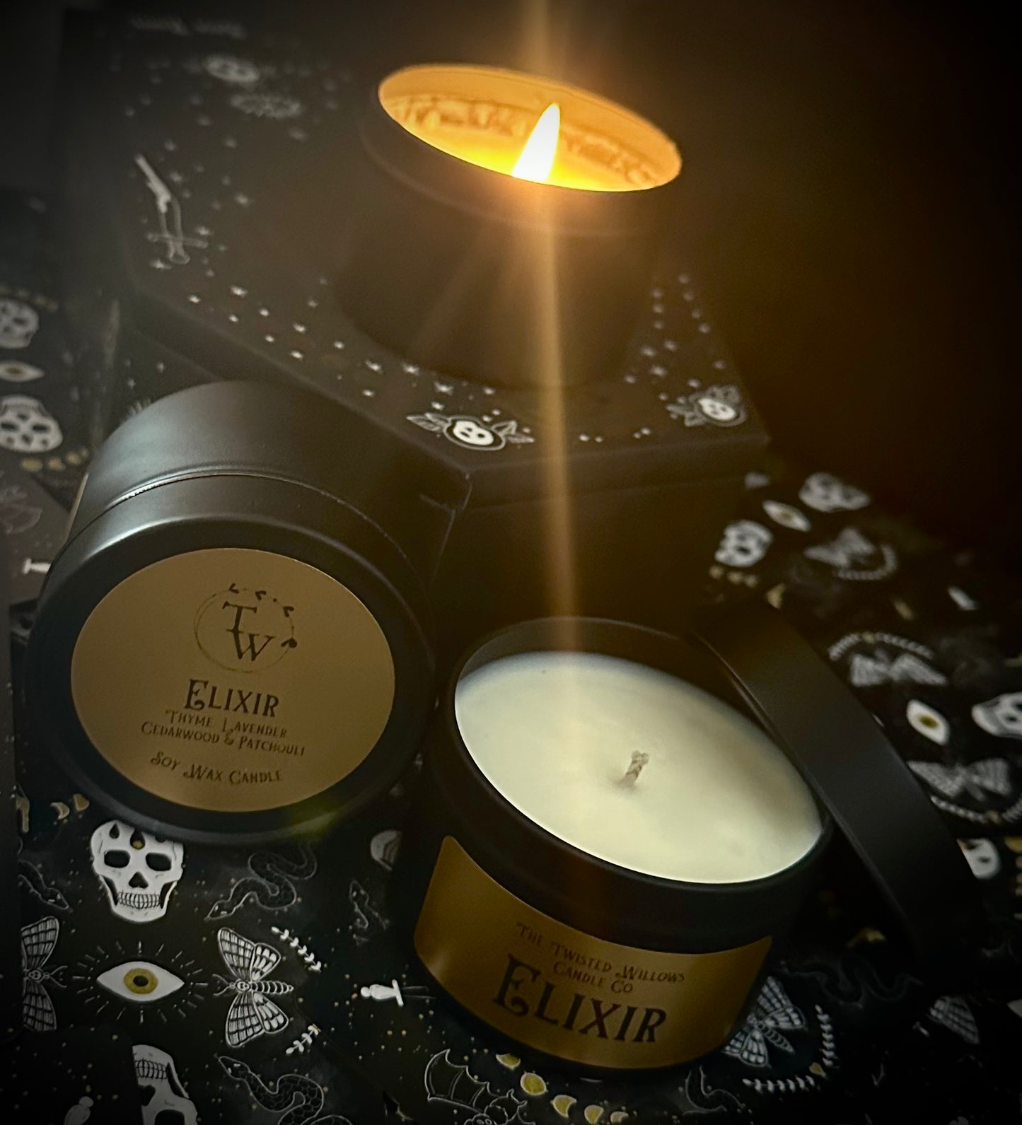 Elixir Tin Candle Open