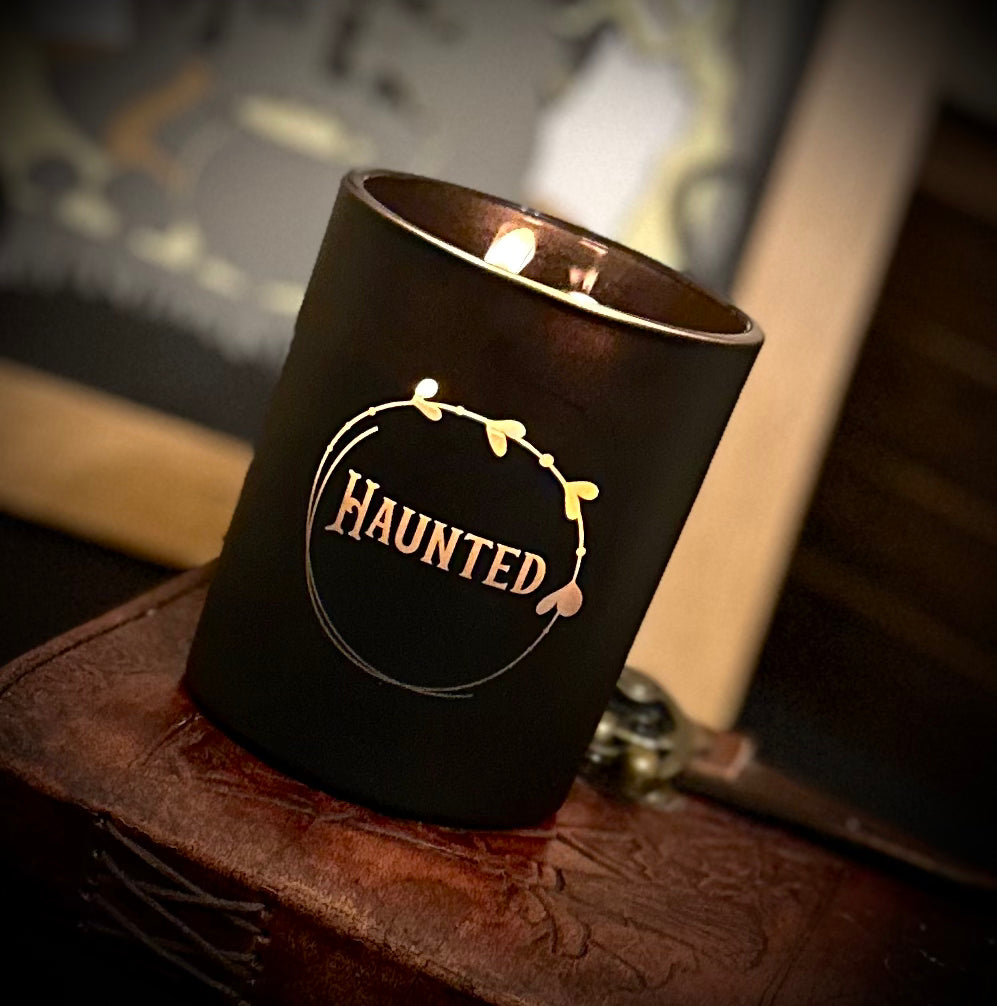 Intricately etched gothic design on a matt black candle jar - Haunted by The Twisted Willows Candle Co