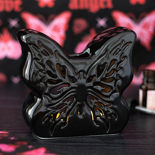 Butterfly Oil Burner with intricate cut out detail.