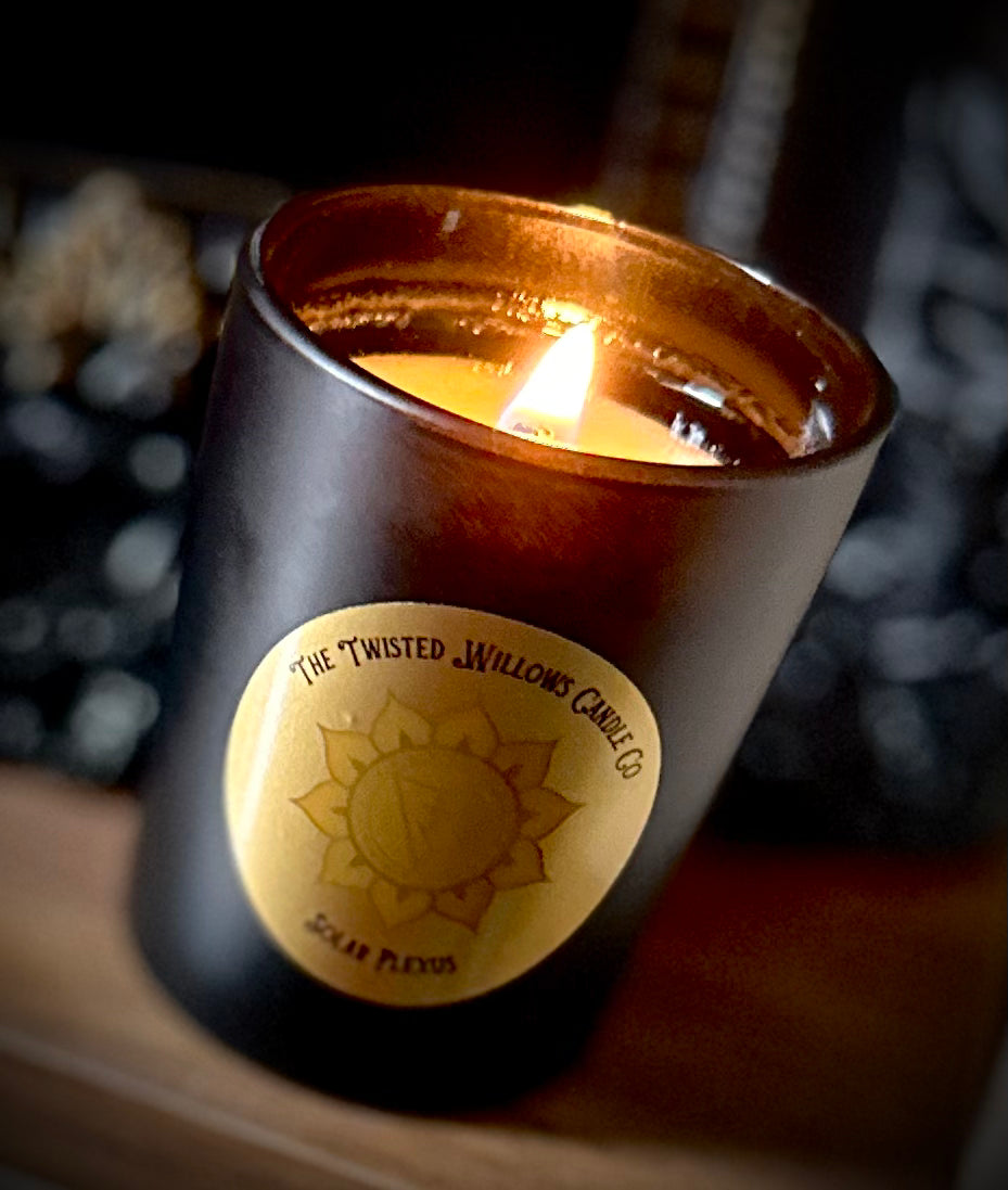 Solar Plexus votive candle with ginger, juniper berry and lemon essential oils in golden soy wax.